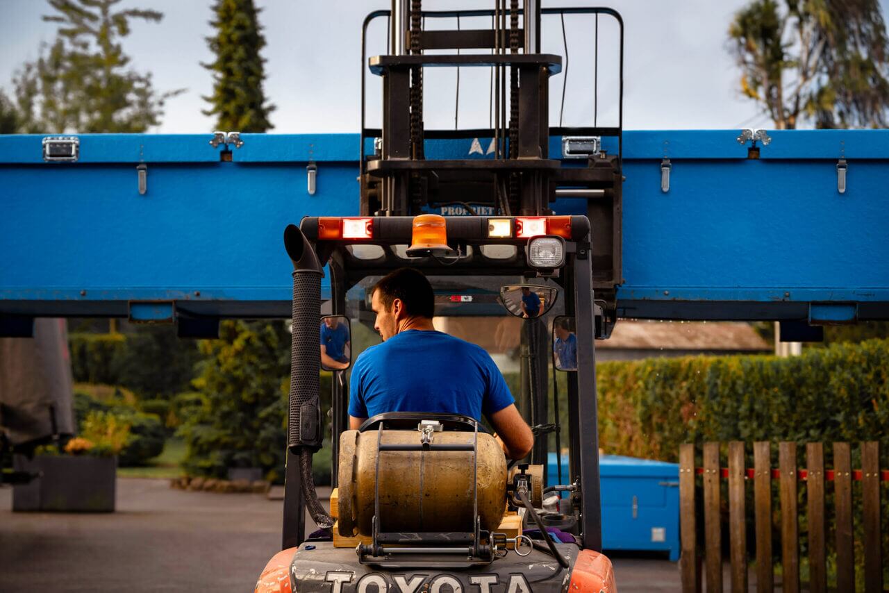 Employee in a forklift truck